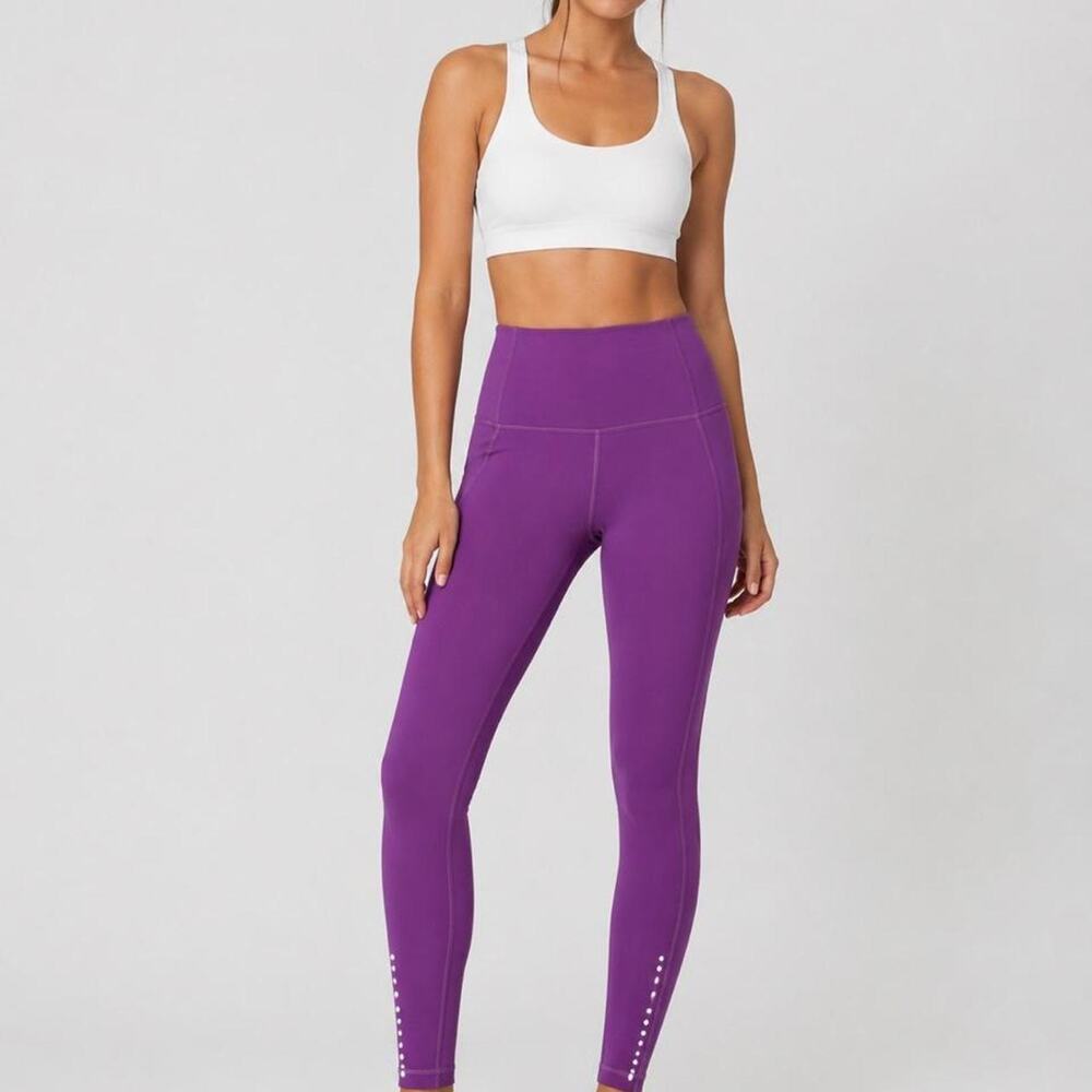 Lululemon Purple high-waisted leggings with white stitching along the sides